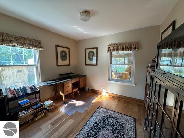 739 Stimson St, Cadillac, MI 49601 - office area with wood finished floors and baseboards