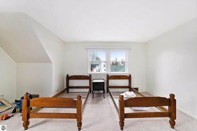 739 Stimson St, Cadillac, MI 49601 - bedroom featuring carpet and baseboards