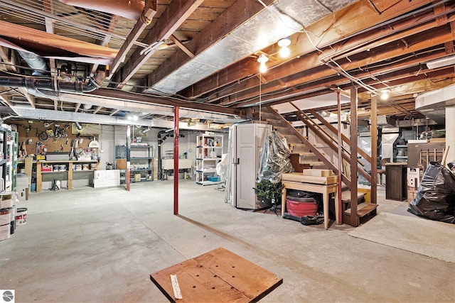739 Stimson St, Cadillac, MI 49601 - unfinished below grade area featuring stairs