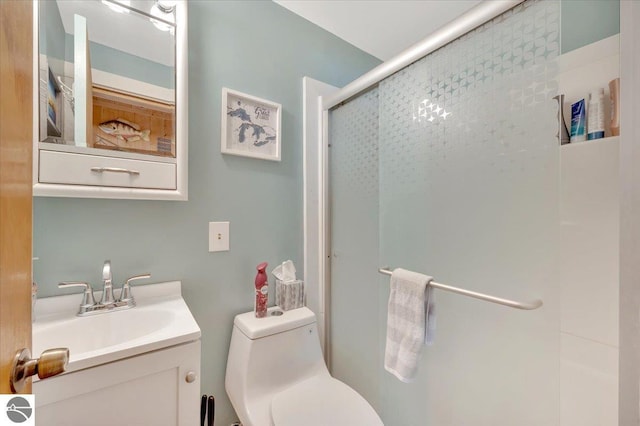 4823 Lakeside Blvd, Hale, MI 48739 - full bathroom featuring a shower with door, toilet, and vanity
