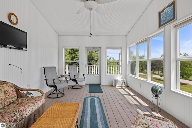3218 Plum Valley Rd NW, Alden, MI 49612 - sunroom with plenty of natural light, hardwood / wood-style floors, a wooden deck, and vaulted ceiling