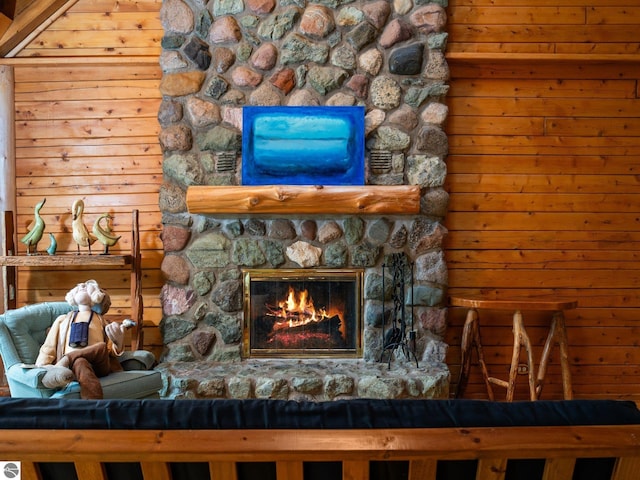 10037 Mud Lake Rd, Interlochen, MI 49643 - detailed view of a fireplace and wooden walls