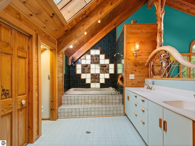 10037 Mud Lake Rd, Interlochen, MI 49643 - full bath with lofted ceiling, tile patterned floors, double vanity, and tiled shower / bath