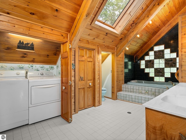 10037 Mud Lake Rd, Interlochen, MI 49643 - bathroom with a bath, lofted ceiling, tile patterned flooring, wood walls, and wooden ceiling