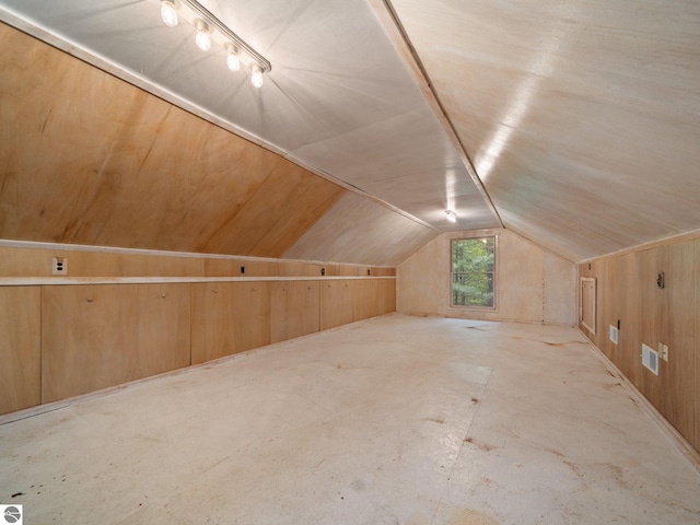 10037 Mud Lake Rd, Interlochen, MI 49643 - bonus room with lofted ceiling and wooden walls