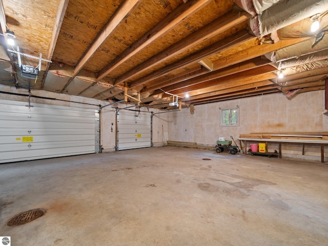10037 Mud Lake Rd, Interlochen, MI 49643 - garage with a garage door opener