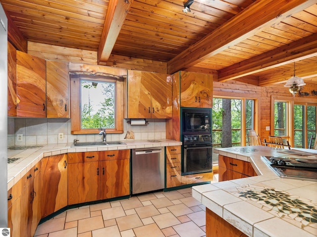 10037 Mud Lake Rd, Interlochen, MI 49643 - kitchen featuring black appliances, tile countertops, tasteful backsplash, a wooden ceiling with exposed beams, and wooden walls