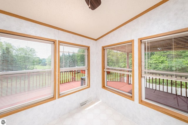 19275 Coates Hwy, Brethren, MI 49619 - unfurnished sunroom featuring lofted ceiling, crown molding, and a textured ceiling