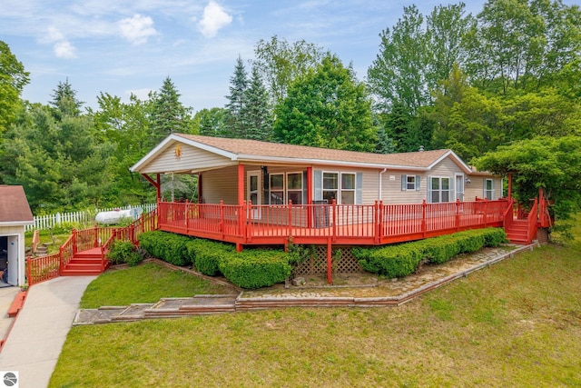 19275 Coates Hwy, Brethren, MI 49619 - ranch-style home featuring a front lawn, roof with shingles, and a wooden deck