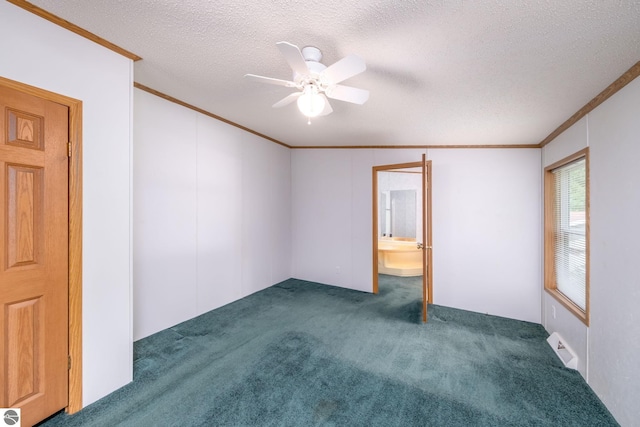 19275 Coates Hwy, Brethren, MI 49619 - carpeted empty room featuring ornamental molding, ceiling fan, and a textured ceiling