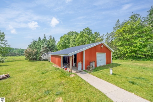 19275 Coates Hwy, Brethren, MI 49619 - view of pole building with a yard