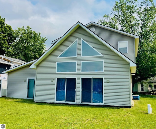 1415 Paczesny Pl, Central Lake, MI 49622 - back of property with a lawn