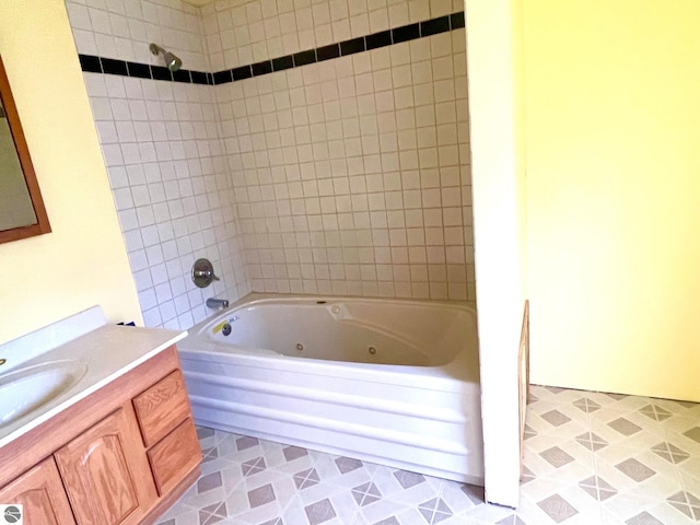 1415 Paczesny Pl, Central Lake, MI 49622 - bathroom featuring vanity and a combined bath / shower with jetted tub