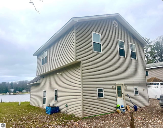1415 Paczesny Pl, Central Lake, MI 49622 - back of house with a water view