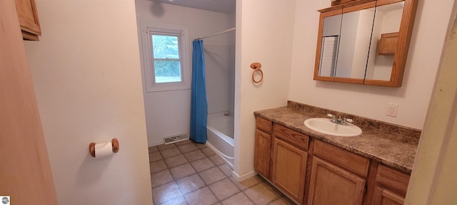601 Monroe, Mancelona, MI 49659 - full bath with vanity, shower / bath combo, and tile patterned floors