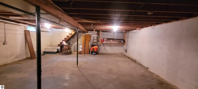 601 Monroe, Mancelona, MI 49659 - unfinished basement featuring stairway
