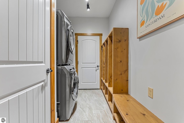 3872 Falling Leaf Trl, Traverse City, MI 49686 - washroom featuring stacked washing machine and dryer