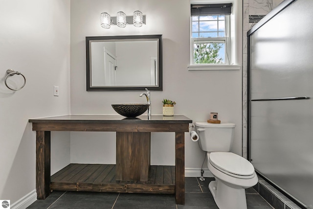 3872 Falling Leaf Trl, Traverse City, MI 49686 - full bathroom featuring tile patterned floors, a stall shower, and vanity