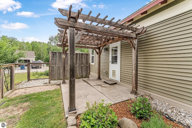 3872 Falling Leaf Trl, Traverse City, MI 49686 - view of patio with a pergola
