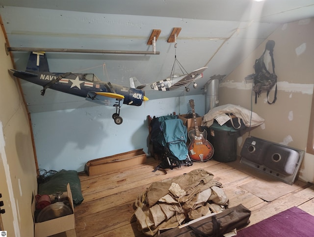 5094 SW Old Butler Rd Unit 1, South Boardman, MI 49680 - basement with hardwood / wood-style flooring