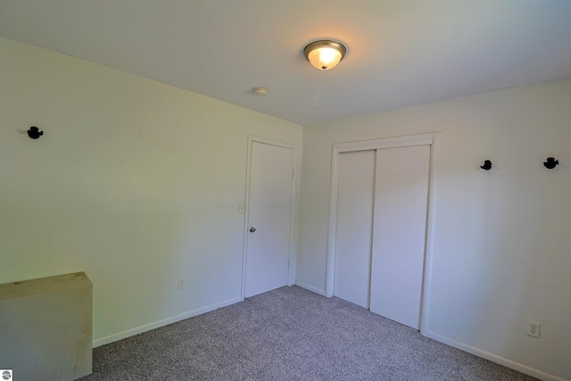1220 E Gaylord St, Mount Pleasant, MI 48858 - unfurnished bedroom featuring carpet floors and a closet