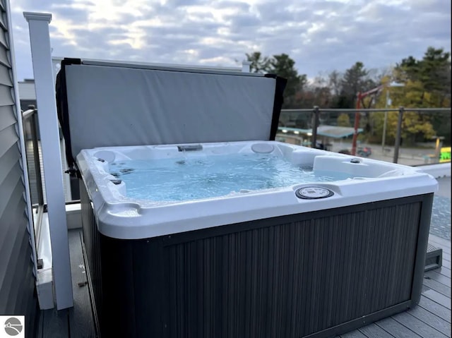 914-14 E Front St Unit 14, Traverse City, MI 49686 - wooden terrace with a hot tub