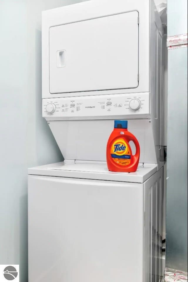 914-14 E Front St Unit 14, Traverse City, MI 49686 - laundry area with stacked washer / drying machine