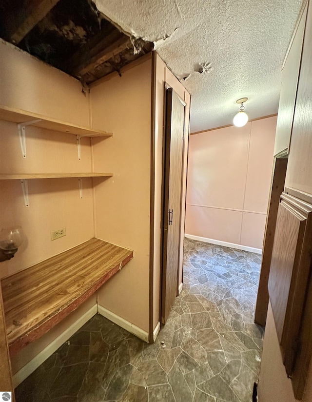 8334 Cinder Hill Rd, Mancelona, MI 49659 - hallway with baseboards