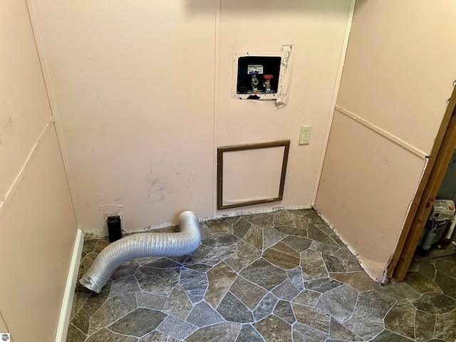 8334 Cinder Hill Rd, Mancelona, MI 49659 - washroom featuring stone floors