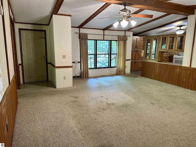8334 Cinder Hill Rd, Mancelona, MI 49659 - unfurnished living room featuring a ceiling fan and carpet