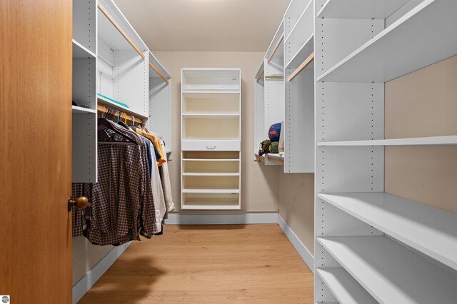4340 E Huron River Dr, Ann Arbor, MI 48105 - spacious closet featuring wood finished floors