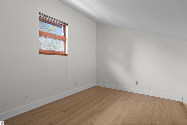 4340 E Huron River Dr, Ann Arbor, MI 48105 - bonus room with baseboards and light wood-type flooring