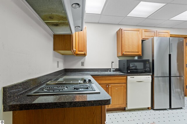 4340 E Huron River Dr, Ann Arbor, MI 48105 - kitchen with dishwasher, freestanding refrigerator, black microwave, electric stovetop, and dark countertops