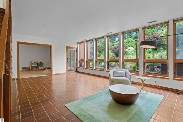 4340 E Huron River Dr, Ann Arbor, MI 48105 - sunroom with tile patterned floors and baseboards