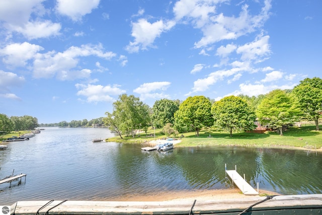 7746 Five Lakes Dr, Farwell, MI 48622 - dock featuring a water view