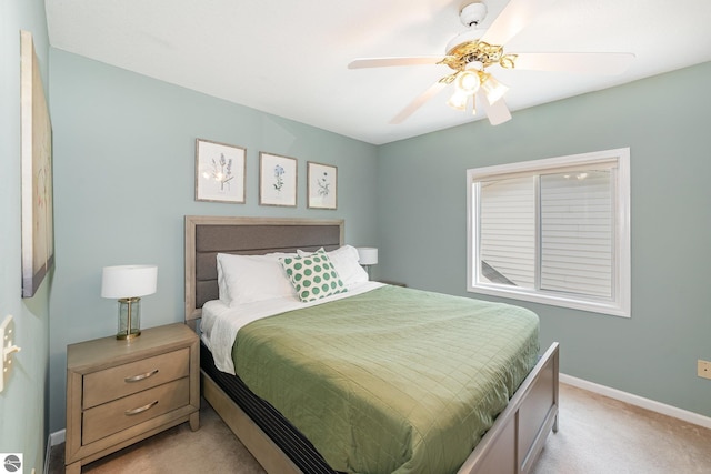 7746 Five Lakes Dr, Farwell, MI 48622 - bedroom featuring light colored carpet and a ceiling fan