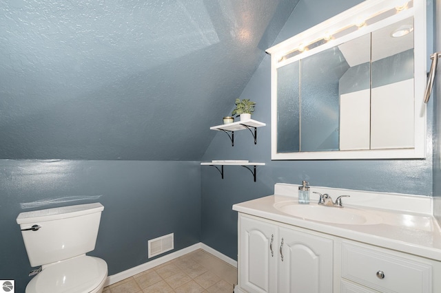 7746 Five Lakes Dr, Farwell, MI 48622 - half bath featuring lofted ceiling, vanity, and tile patterned floors