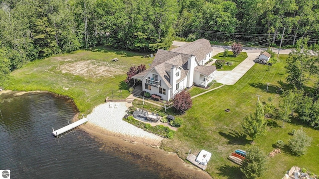 7746 Five Lakes Dr, Farwell, MI 48622 - aerial view of property and surrounding area with a nearby body of water