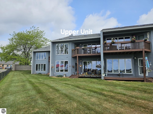 407 W Lake St Unit 45, Tawas City, MI 48763 - back of property featuring a balcony