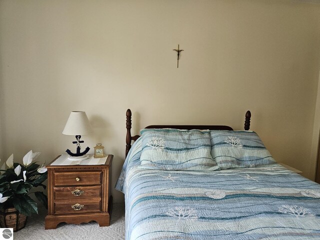 407 W Lake St Unit 45, Tawas City, MI 48763 - bedroom featuring carpet flooring