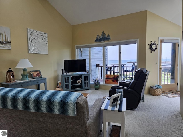 407 W Lake St Unit 45, Tawas City, MI 48763 - carpeted living room featuring healthy amount of natural light and lofted ceiling