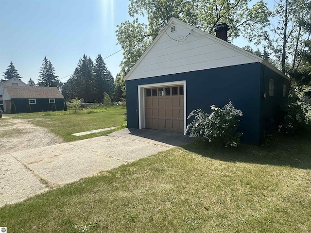 501 W 13th St, Cadillac, MI 49601 - detached garage with concrete driveway