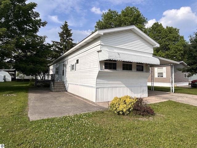 4510 W Country Way, Saginaw, MI 48603 - view of property exterior featuring a yard