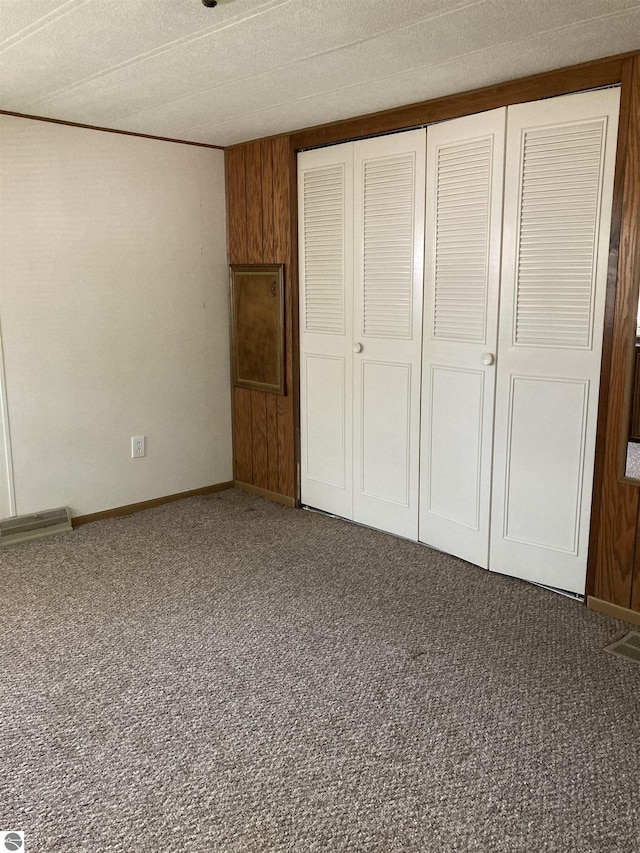 4510 W Country Way, Saginaw, MI 48603 - unfurnished bedroom featuring carpet floors and a closet