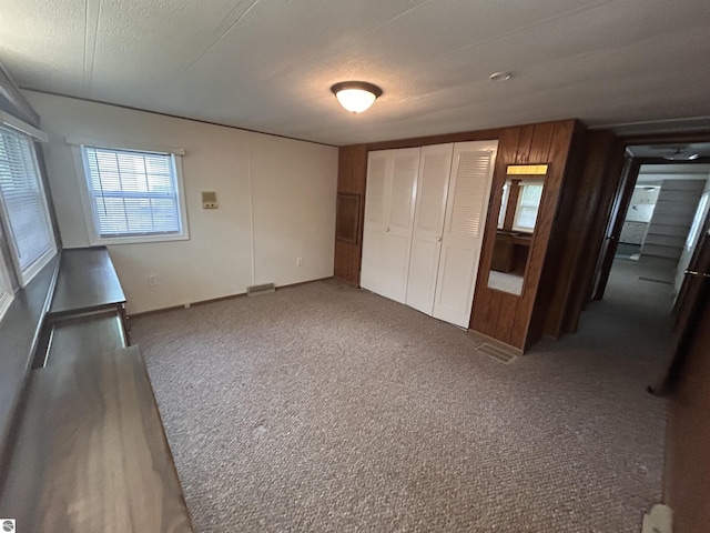 4510 W Country Way, Saginaw, MI 48603 - unfurnished bedroom featuring carpet and a closet