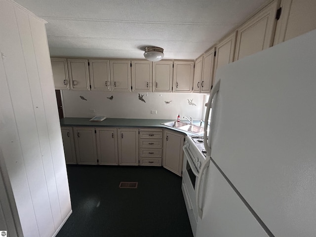 4510 W Country Way, Saginaw, MI 48603 - kitchen featuring white appliances and cream cabinets