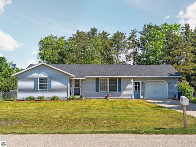 1708 Ketha Dr, Cadillac, MI 49601 - ranch-style home with an attached garage and concrete driveway