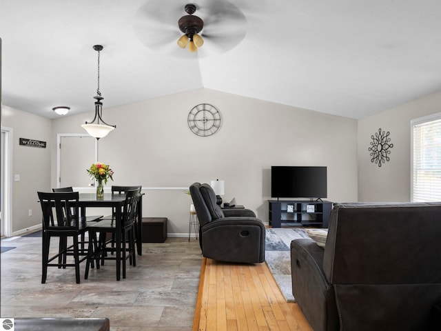 1708 Ketha Dr, Cadillac, MI 49601 - living room featuring ceiling fan and lofted ceiling