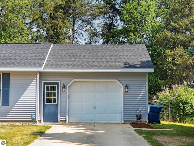1708 Ketha Dr, Cadillac, MI 49601 - garage featuring concrete driveway