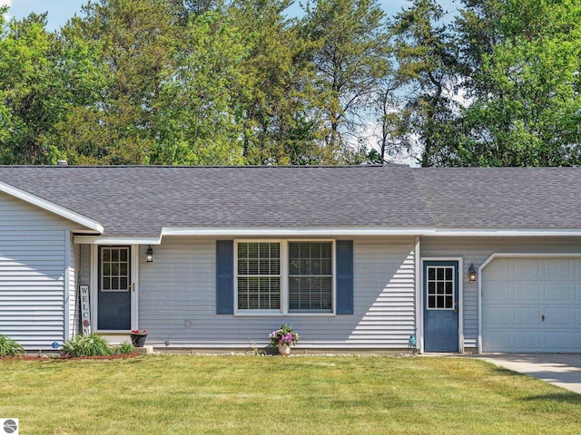 1708 Ketha Dr, Cadillac, MI 49601 - ranch-style home with a garage, a front yard, and roof with shingles